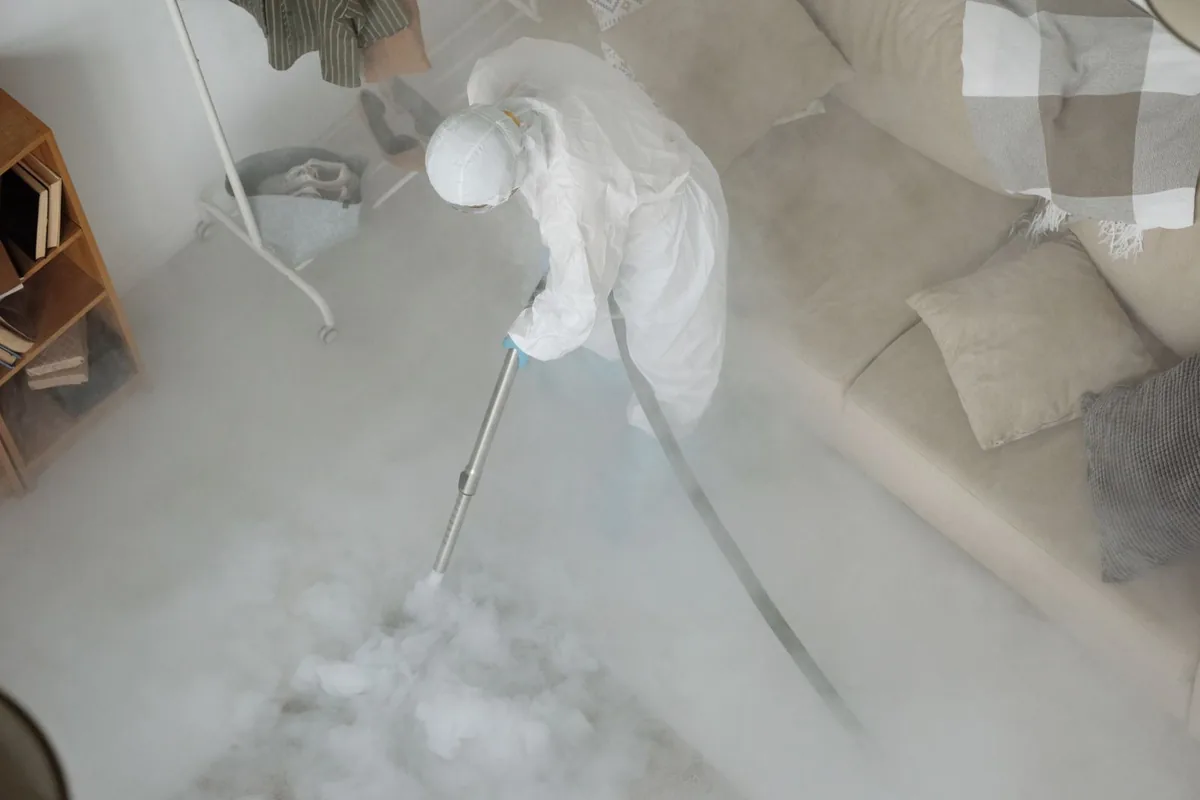 Biohazard cleanup technician in protective equipment, Graniteville, SC